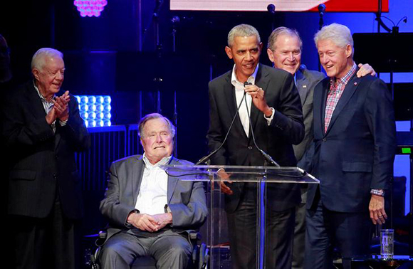  Five former U.S. presidents, Jimmy Carter, George H.W. Bush, Barack Obama, George W. Bush and Bill Clinton, speak during a concert at Texas A&M University benefiting hurricane relief efforts in College Station, Texas, U.S., October 21, 2017. Photo by Richard Carson 