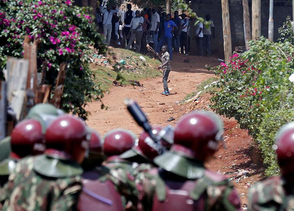  Anti-riot police attempt to disperse protesters in Kawangware slums in Nairobi, Kenya October 28, 2017. Photo by Thomas Mukoya 