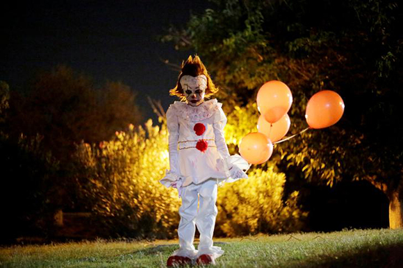  A boy dressed as Pennywise the Dancing Clown from the movie "It" poses for a photo during a Halloween party in Ciudad Juarez, Mexico. Photo by Jose Luis Gonzalez 