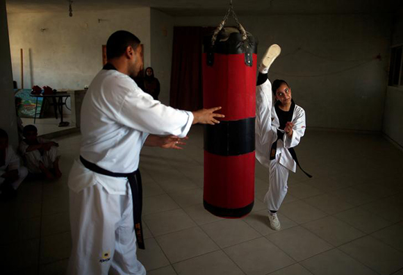  Palestinian girl Zainab Al-Krunz, 14, takes part in a Taekwondo training session in the central Gaza Strip. Photo by Mohammed Salem 