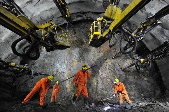  Workers are seen in a tunnel for the Beijing-Zhangjiakou high speed railway under construction in Beijing, China. Photo by Stringer 