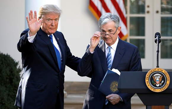  U.S. President Donald Trump gestures with Jerome Powell, his nominee to become chairman of the U.S. Federal Reserve at the White House in Washington, U.S., November 2, 2017. Photo by Carlos Barria 