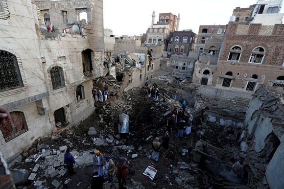 People gather at the site of an air strike in Sanaa, Yemen November 11, 2017. Photo by Khaled Abdullah