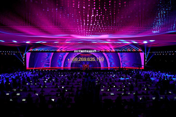 A screen shows the value of goods being transacted at Alibaba Group's 11.11 Singles' Day global shopping festival in Shanghai, China, November 12, 2017. Photo by Aly Song