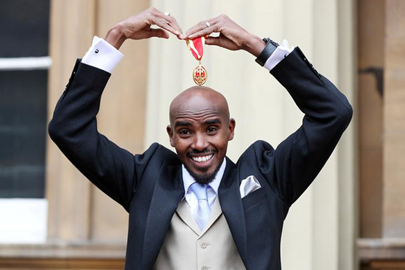 Mo Farah poses after he received his knighthood from Britain's Queen Elizabeth at Buckingham Palace, London, Britain November 14, 2017. Photo by Jonathan Brady