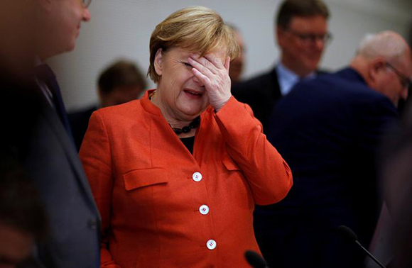  German Chancellor Angela Merkel attends a meeting of the CDU/CSU parliamentary group at the Bundestag in Berlin, Germany, November 20, 2017. Photo by Axel Schmidt 