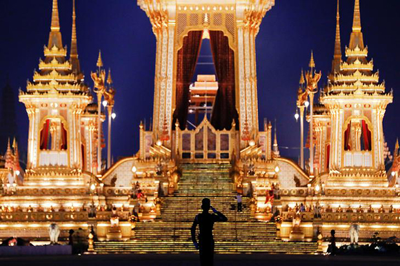  A soldier salutes in front of the Royal Crematorium during a funeral for the late King Bhumibol Adulyadej near the Grand Palace in Bangkok, Thailand, October 27, 2017. Photo by Damir Sagolj 