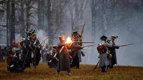  People dressed in the historic uniforms of the French army take part in a re-enactment of the 1812 Battle of Berezina, to mark the 205th anniversary of the battle, near the village of Bryli, Belarus. Photo by Vasily Fedosenko 