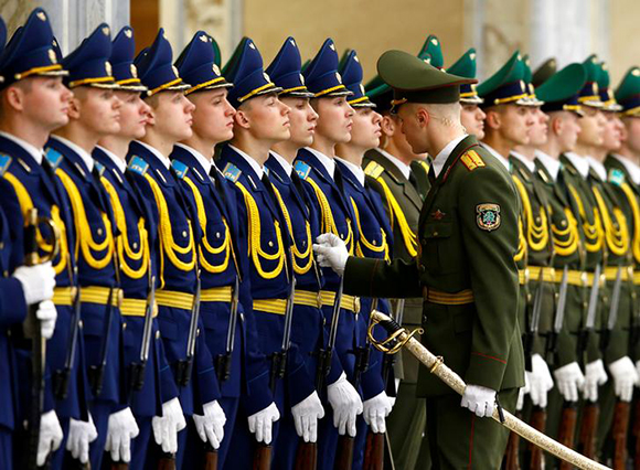  Members of the honor guard prepare before the meeting of Belarussian President Alexander Lukashenko with his Kazakh counterpart Nursultan Nazarbayev at the Independence Palace in Minsk, Belarus. Photo by Vasily Fedosenko 