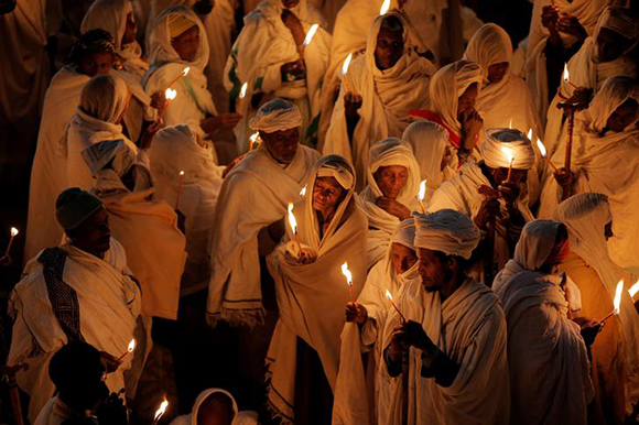  Ethiopian Orthodox pilgrims attend Christmas Eve celebration in Bete Mariam (House of Mary) monolithic Orthodox church in Lalibela, Ethiopia January 6, 2018. Picture taken January 6, 2018. Photo by Ginnette Riquelme 