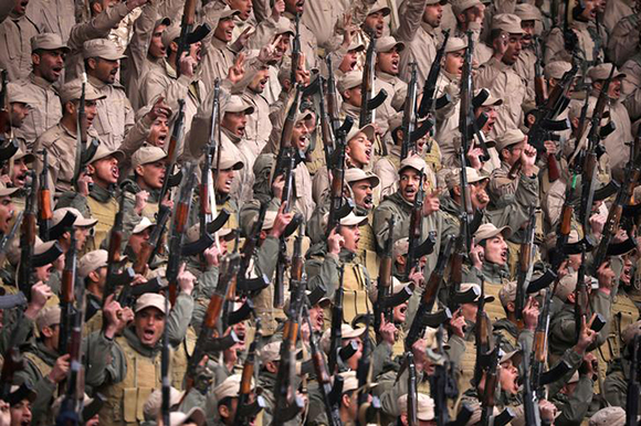  Fighters from the self-defence forces of the Kurdish-led north hold their weapons during a rally in Hasaka, northeastern Syria, January 23, 2018. Photo by Rodi Said 