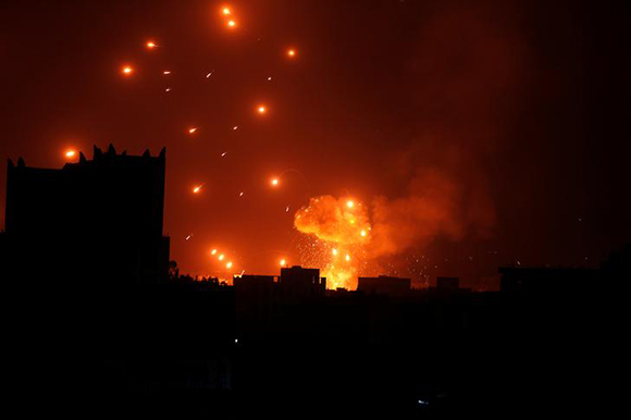  A Houthi arms depot explodes after it was hit by air strikes in Sanaa, Yemen January 31, 2018. Photo by Khaled Abdullah 