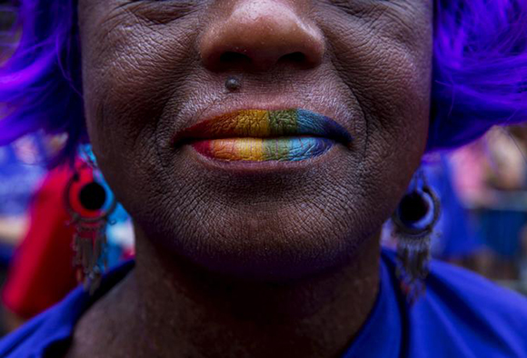  A woman poses for a portrait during the annual NYC Gay Pride parade in New York City. Photo by Eric Thayer 