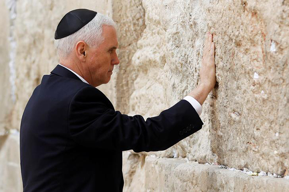  U.S. Vice President Mike Pence touches the Western Wall, Judaism's holiest prayer site, in Jerusalem's Old City January 23, 2018. Photo by Ronen Zvulun 