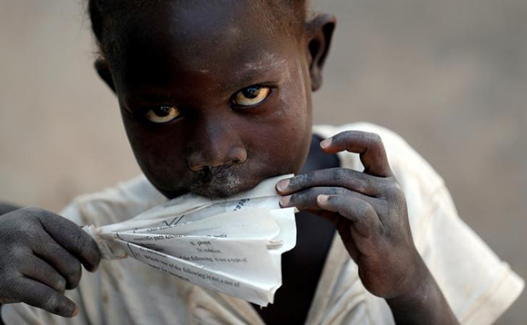  Suede Uma, 6, a South Sudanese refugee child, plays within Kalobeyei Settlement outside the Kakuma refugee camp in Turkana county, northwest of Nairobi, Kenya, January 31, 2018. Photo by Thomas Mukoya 