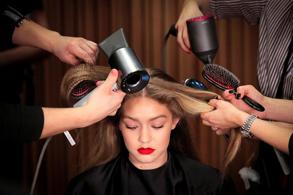  Model Gigi Hadid is prepared backstage before the Brandon Maxwell Fall/Winter 2018 collection presentation at New York Fashion Week in Manhattan, New York, U.S. Photo by Andrew Kelly 