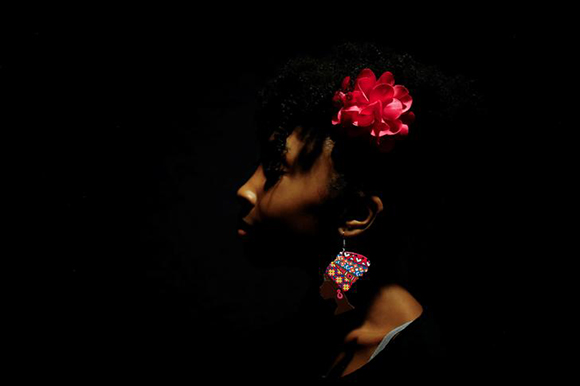  Ron Clark Academy 6th grader Allana Walker, 12, walks down the dark entrance into the movie theater as she joins classmates in watching the film "Black Panther" at Atlantic Station theaters in Atlanta, Georgia, U.S. Photo by Chris Aluka Berry 