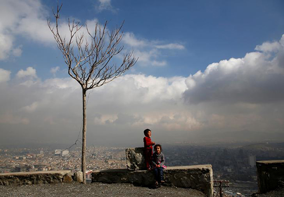  Children play near their house on a hilltop overlooking Kabul, Afghanistan Photo by Mohammad Ismail 