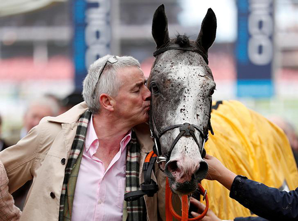 Horse Racing - Cheltenham Festival - Cheltenham Racecourse, Cheltenham, Britain - March 16, 2018 Owner Michael O'Leary celebrates with Farclas ridden by Jack Kennedy after winning the 13.30 JCB Triumph Hurdle. Photo by Andrew Boyers 
