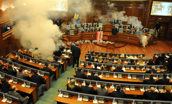  Kosovo opposition politicians release tear gas in parliament to obstruct a session in Pristina, Kosovo March 21, 2018. Photo by Laura Hasani 