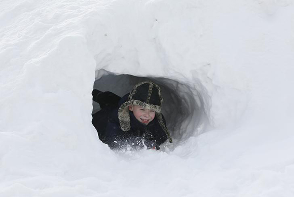  A boy plays in the snow outside the Siberian city of Krasnoyarsk, Russia Photo by Ilya Naymushin 
