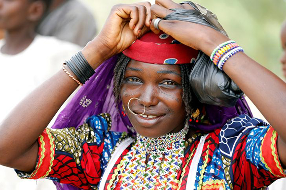  A Fulani woman fixes her head scalf on the street of Dapchi, Yobe state, Nigeria Photo by Afolabi Sotunde 