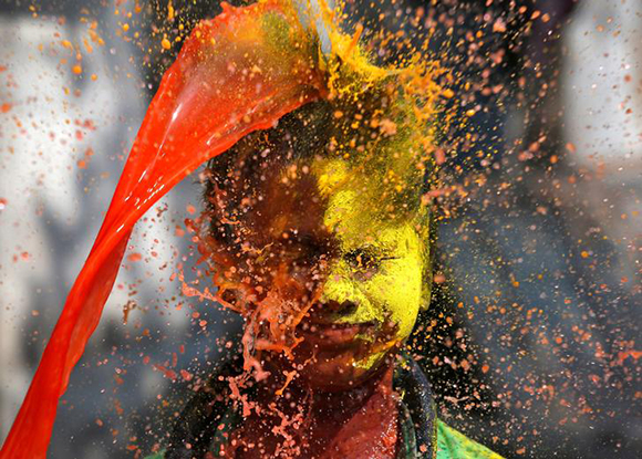  A boy reacts as coloured water is thrown on his face during Holi celebrations in Kolkata, India March 2, 2018. Photo by Rupak De Chowdhuri 