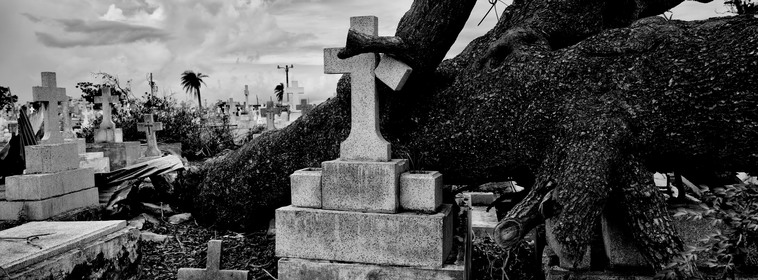 PUERTO RICO. San Juan. 2017. A grave damaged by Hurricane Maria.